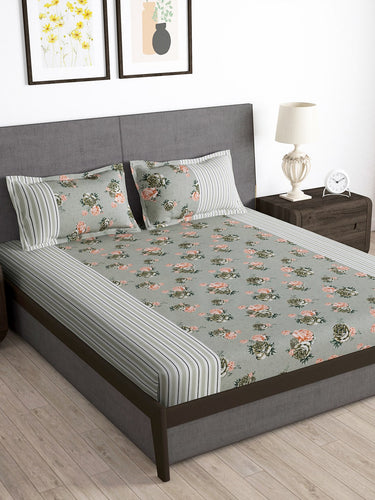 https://cdn.shopify.com/s/files/1/1857/6931/products/0995d5ce-bb39-42d9-9b80-fd9f03a182591685959327215-Storyhome-Arena-Grey--Pink-Floral-Printed-180-TC-Queen-Bedsh-1.jpg?v=1703230049